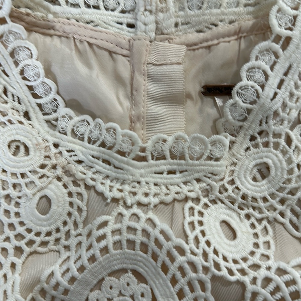 Free People Boho Chic, crocheted, sleeveless, faux wrap dress
Size 2